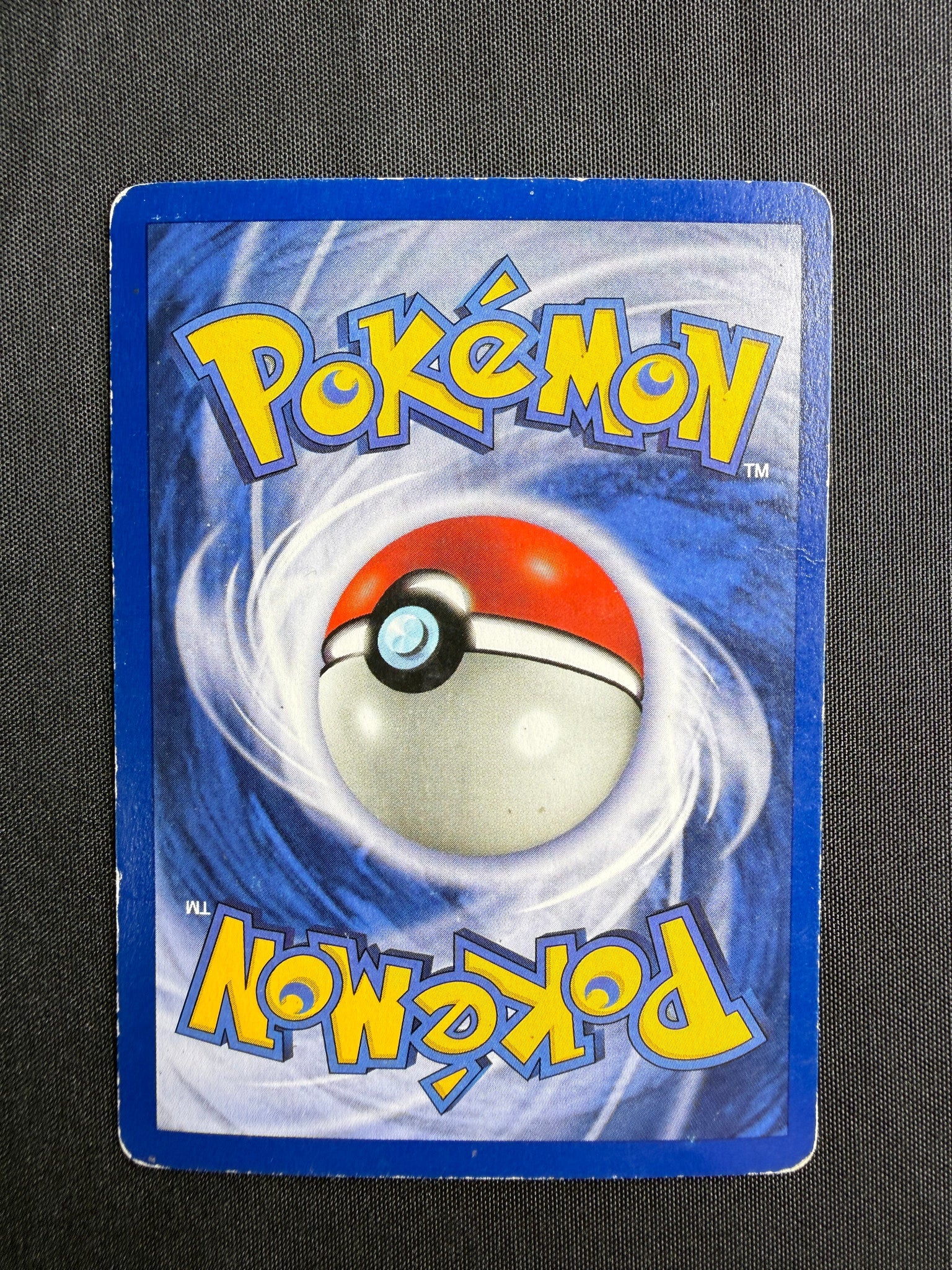 1999 Hitmonchan Base Set 1st Edition Shadowless Holo 7/102 back