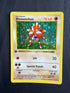 1999 Hitmonchan Base Set 1st Edition Shadowless Holo 7/102 front