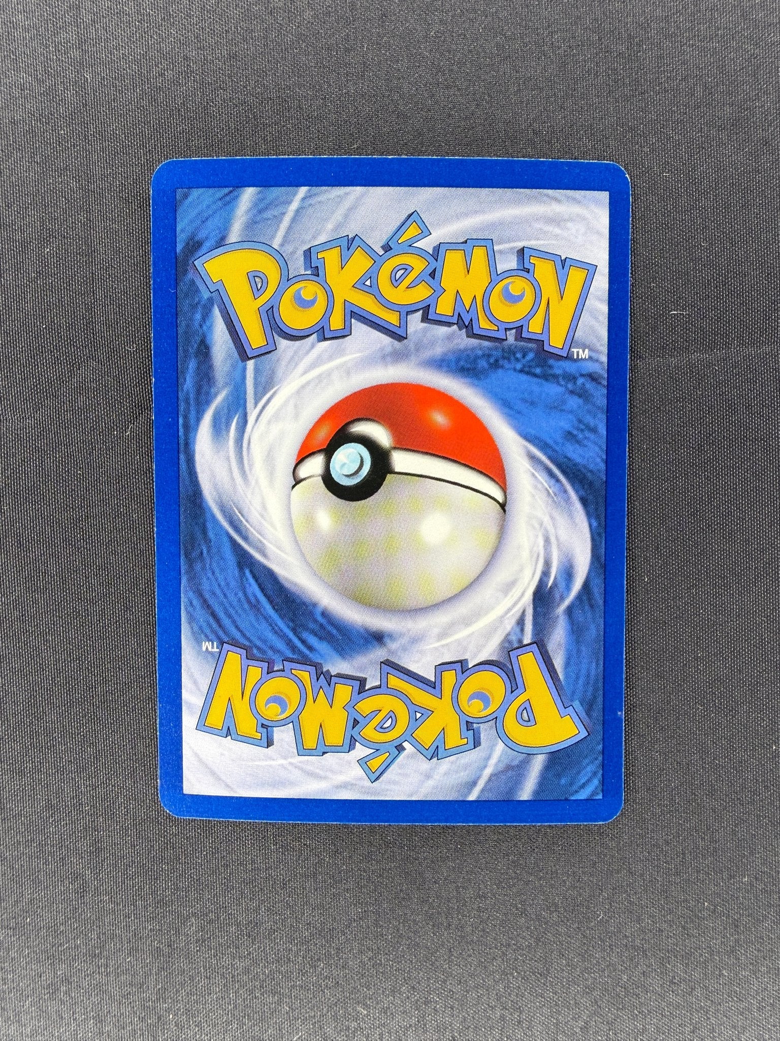 1999 Hitmonlee Fossil 1st Edition Holo 7/62 back