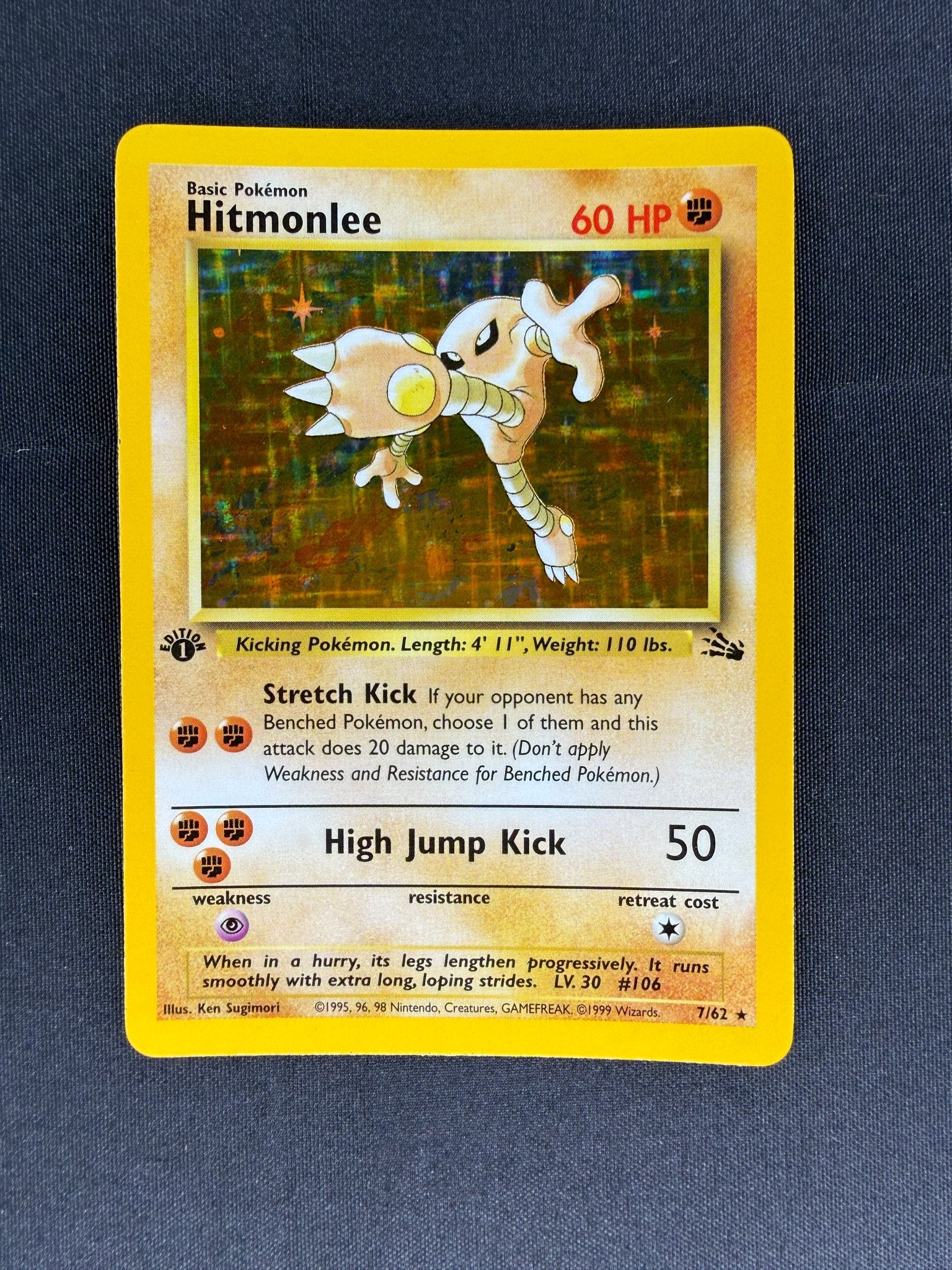 1999 Hitmonlee Fossil 1st Edition Holo 7/62 front