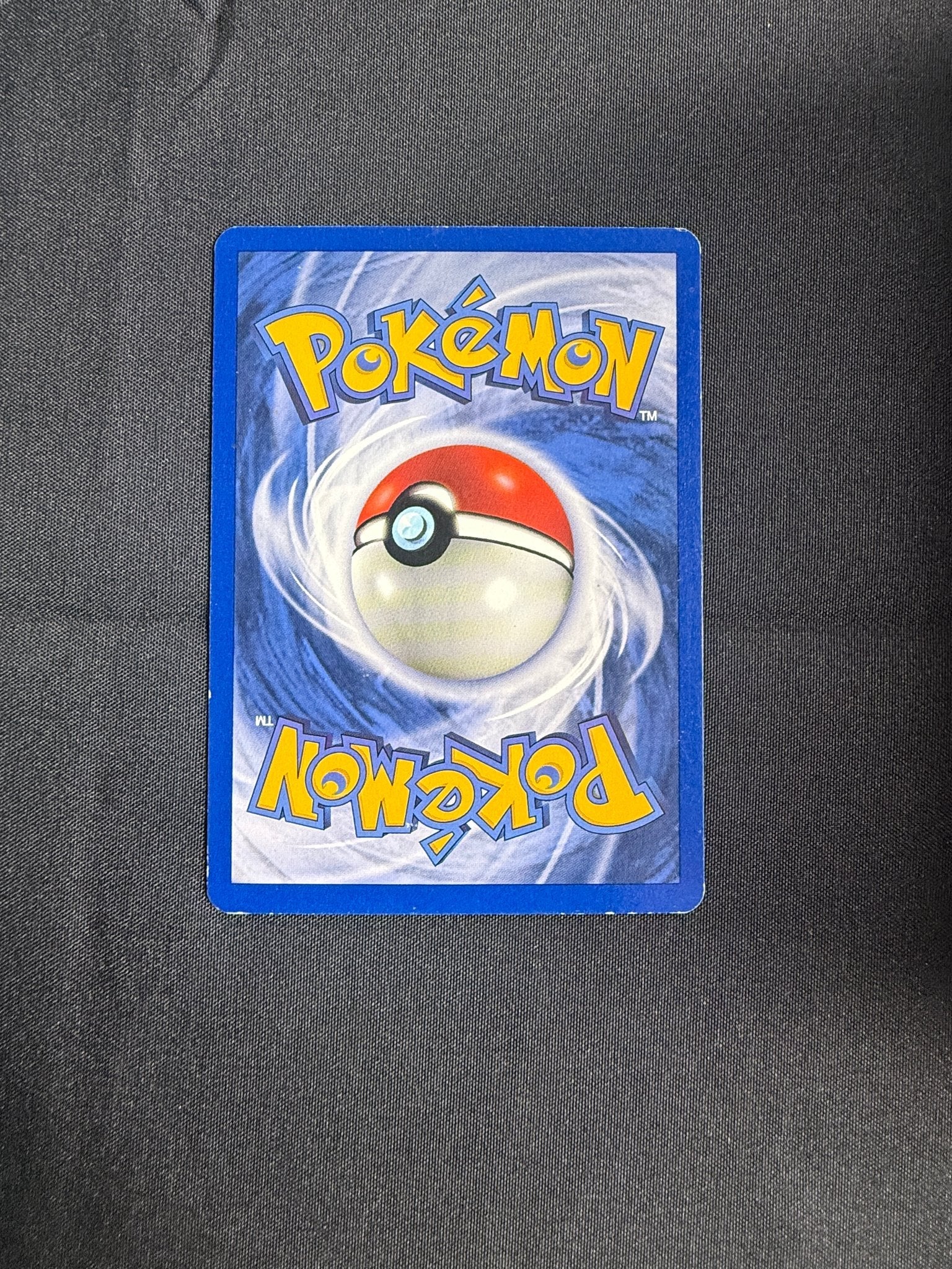 1999 Hitmonlee Fossil Holo 7/62 back
