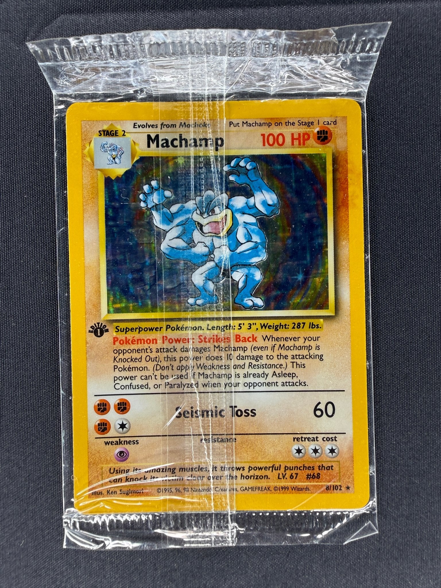 1999 Machamp Base Set 1st Edition Holo 8/102 front