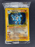1999 Machamp Base Set 1st Edition Holo 8/102 front