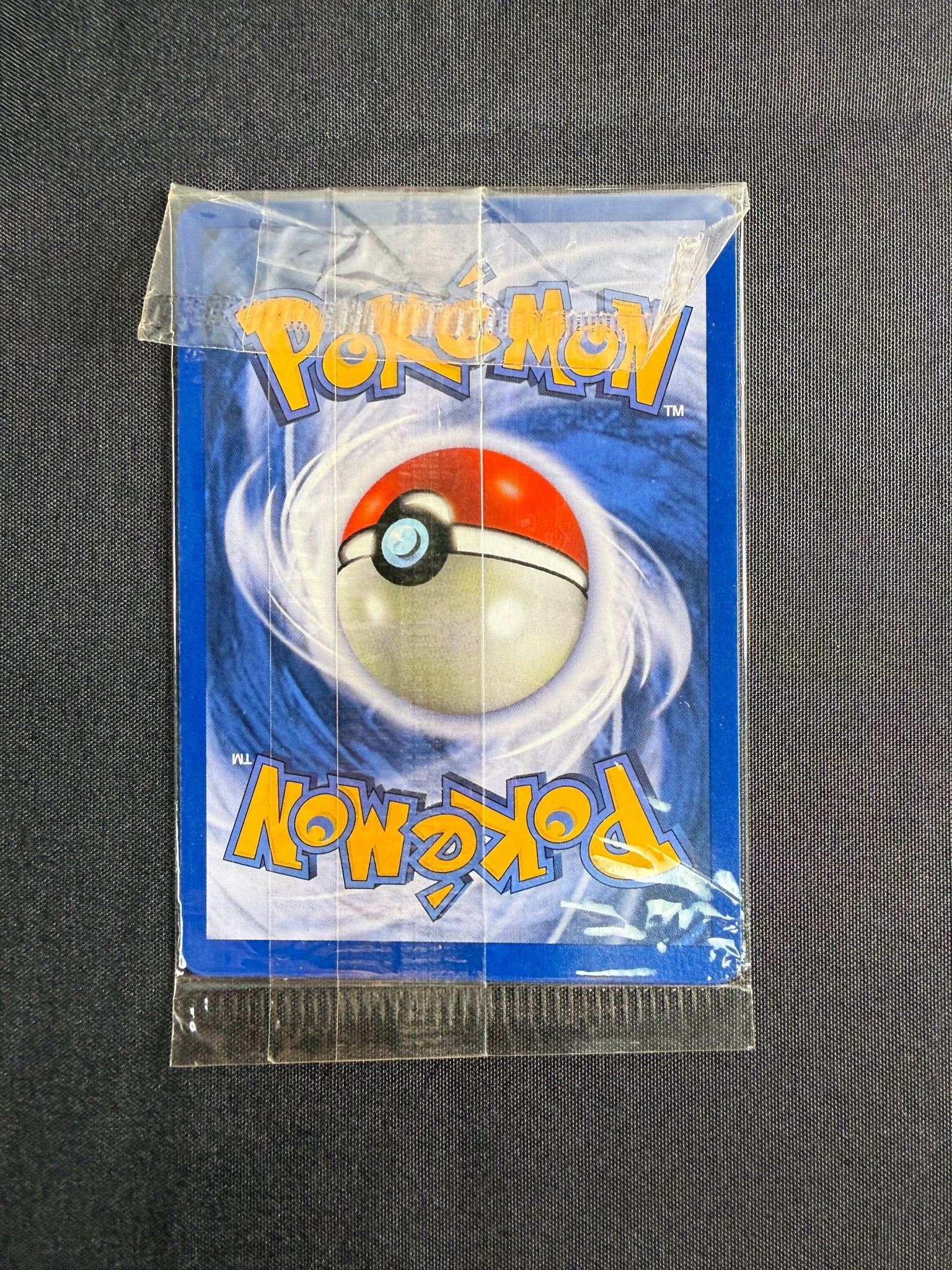 1999 Machamp Base Set 1st Edition Holo 8/102 back