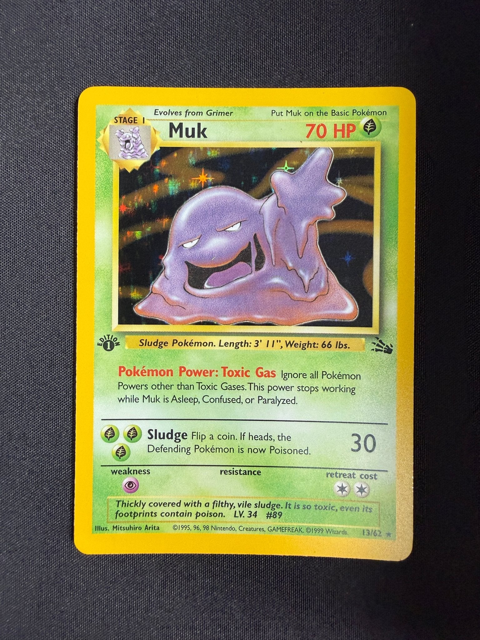 1999 Muk Fossil 1st Edition Holo 13/62 front
