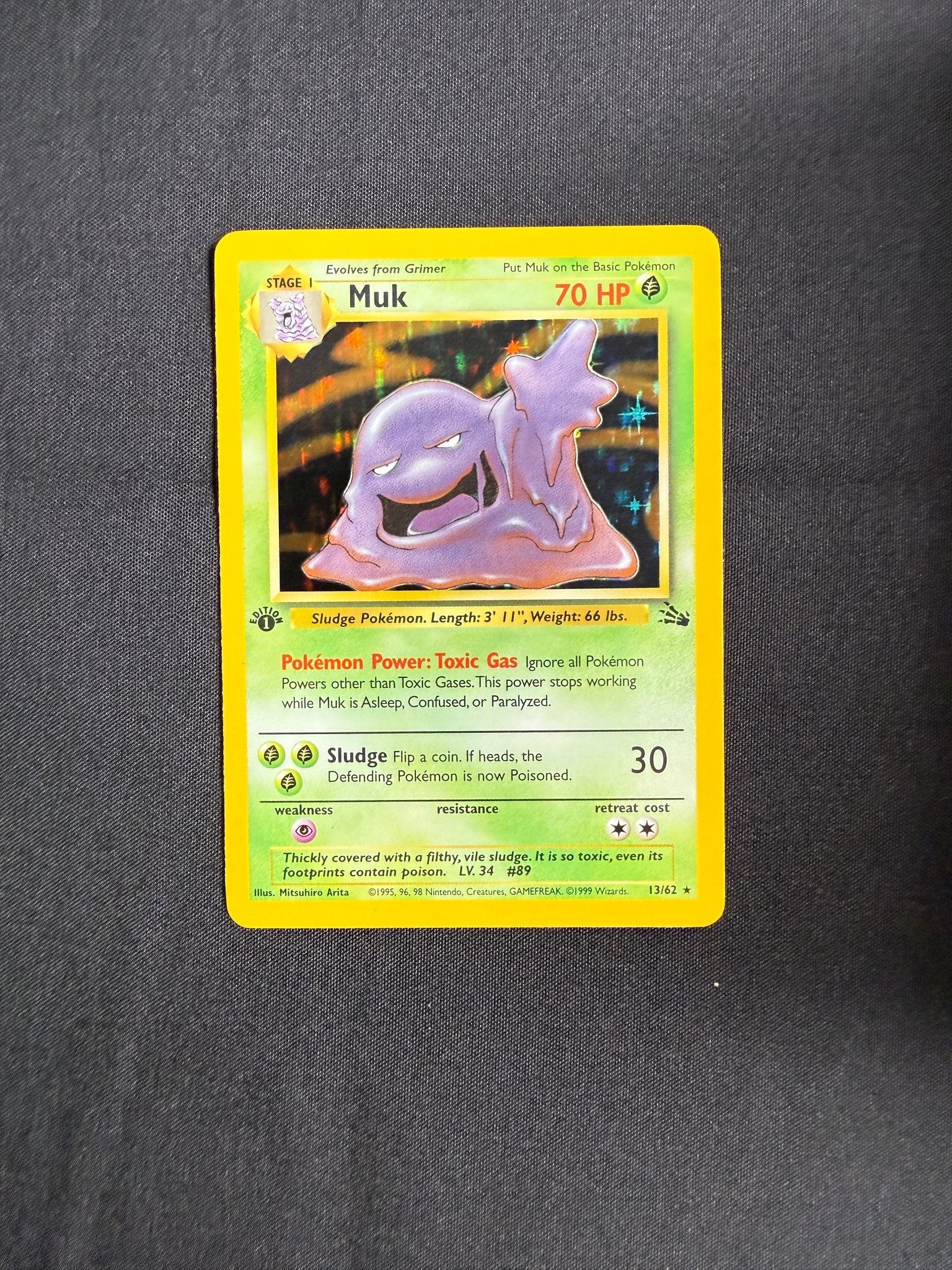 1999 Muk Fossil 1st Edition Holo 13/62 front