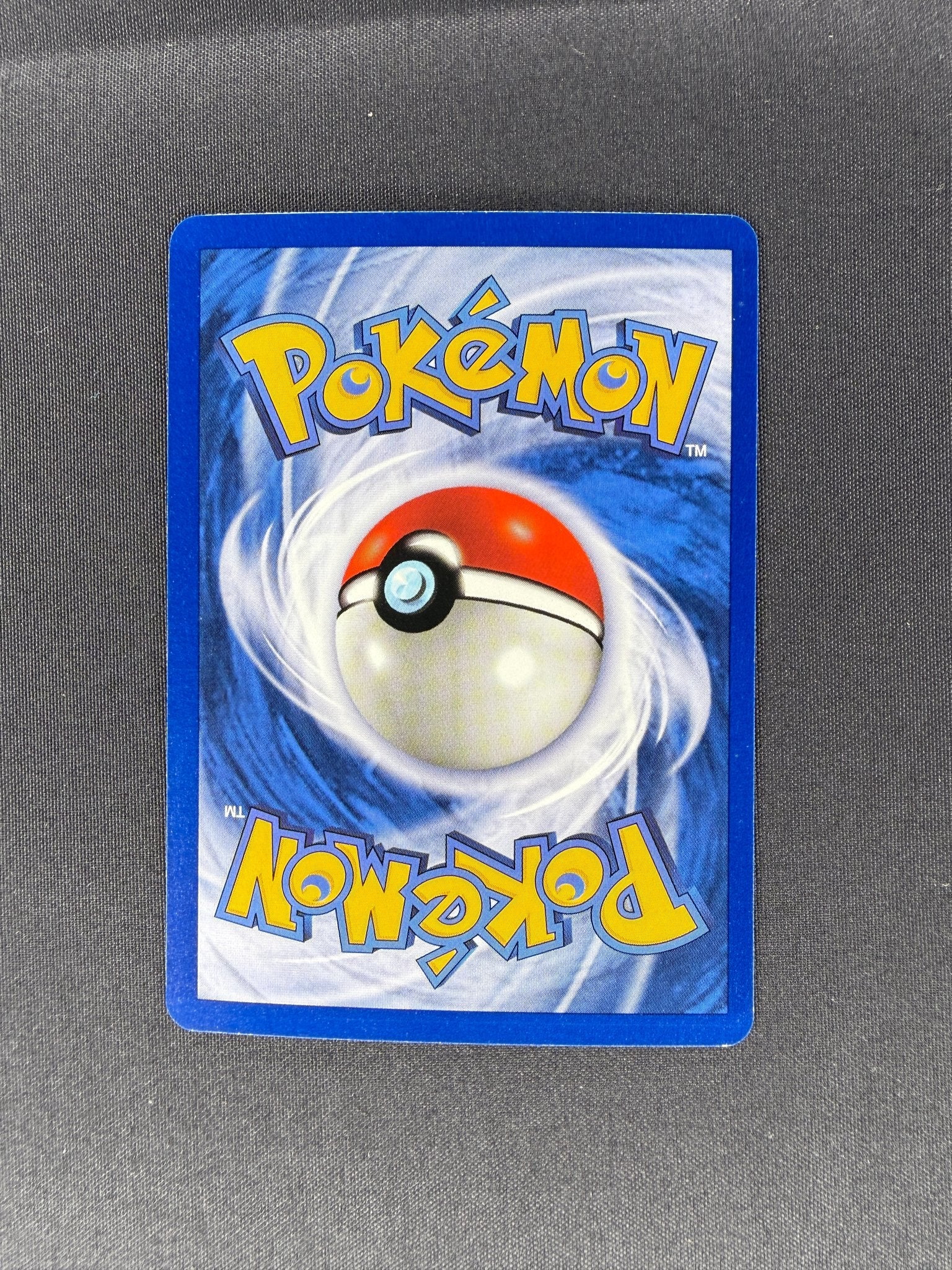 1999 Muk Fossil 1st Edition Holo 13/62 back