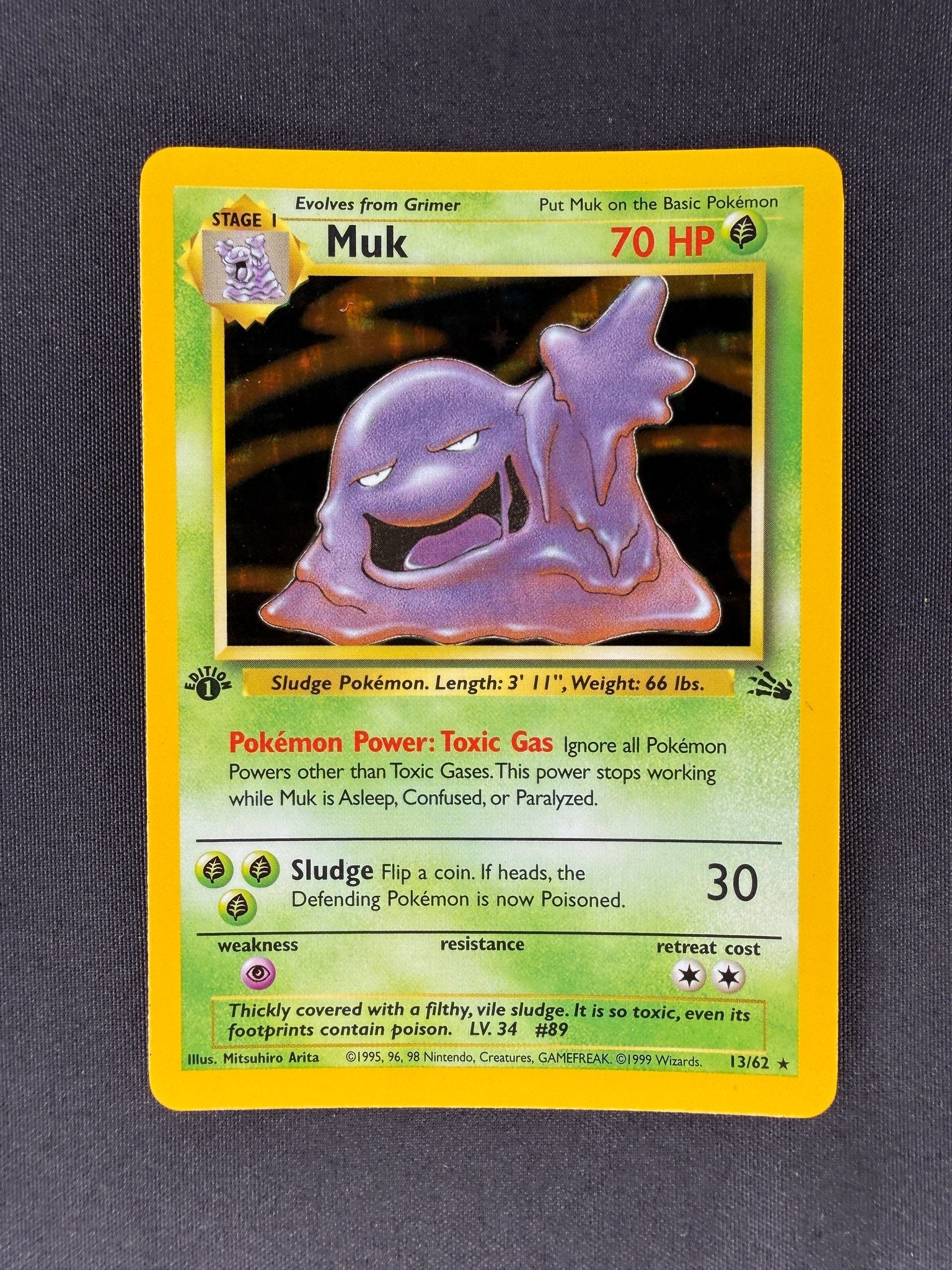 1999 Muk Fossil 1st Edition Holo 13/62 front
