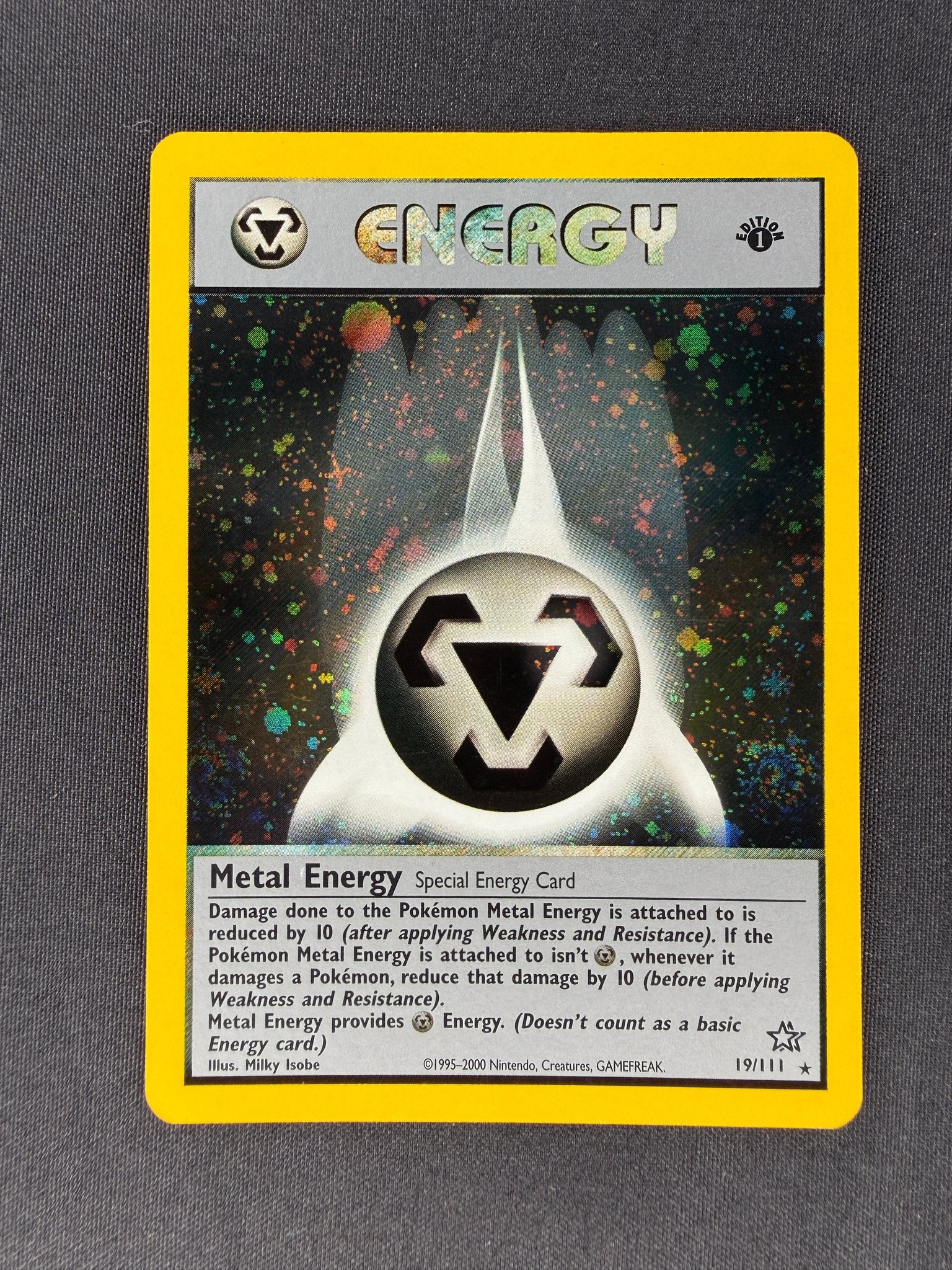 2000 Metal Energy Neo Genesis 1st Edition Holo 19/111 front