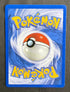 Back of the 2000 Neo Genesis Meganium 1st Edition holo card 10/111, showing the standard blue Pokemon card back with centered Poke Ball