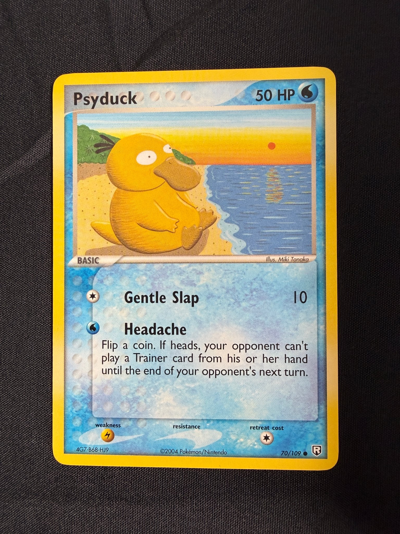 2004 Psyduck EX Team Rocket Returns Reverse Holo 70/109 front