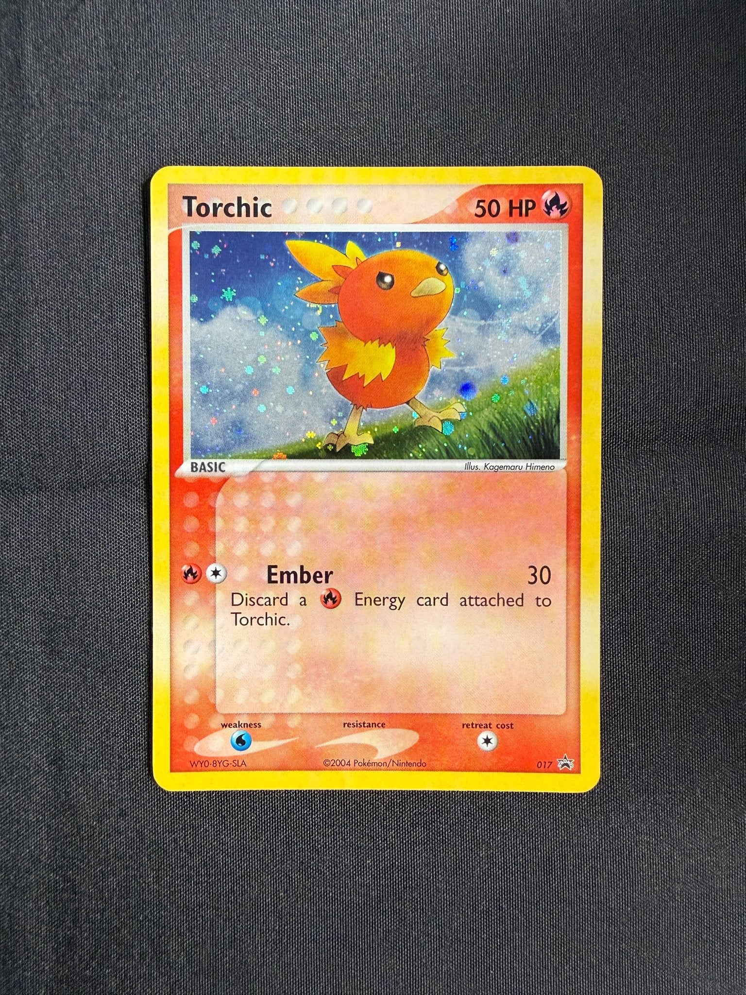 2004 Torchic Nintendo Black Star Promo Holo 017 front